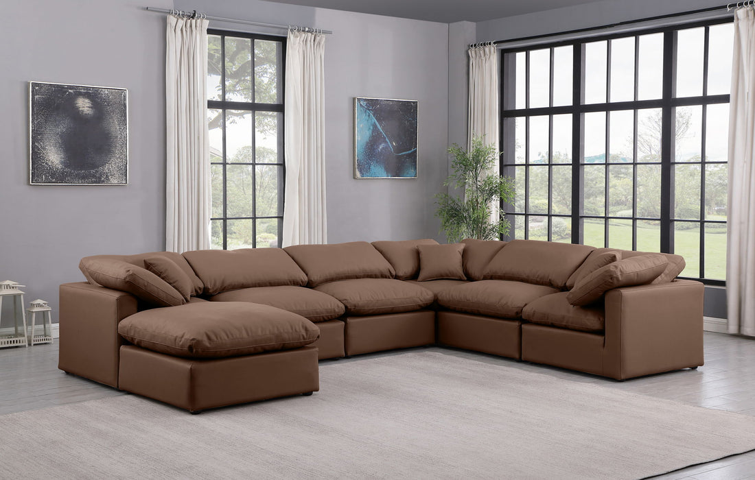 Indulge 140" Vegan Leather Upholstered 7pc. Modular Sectional